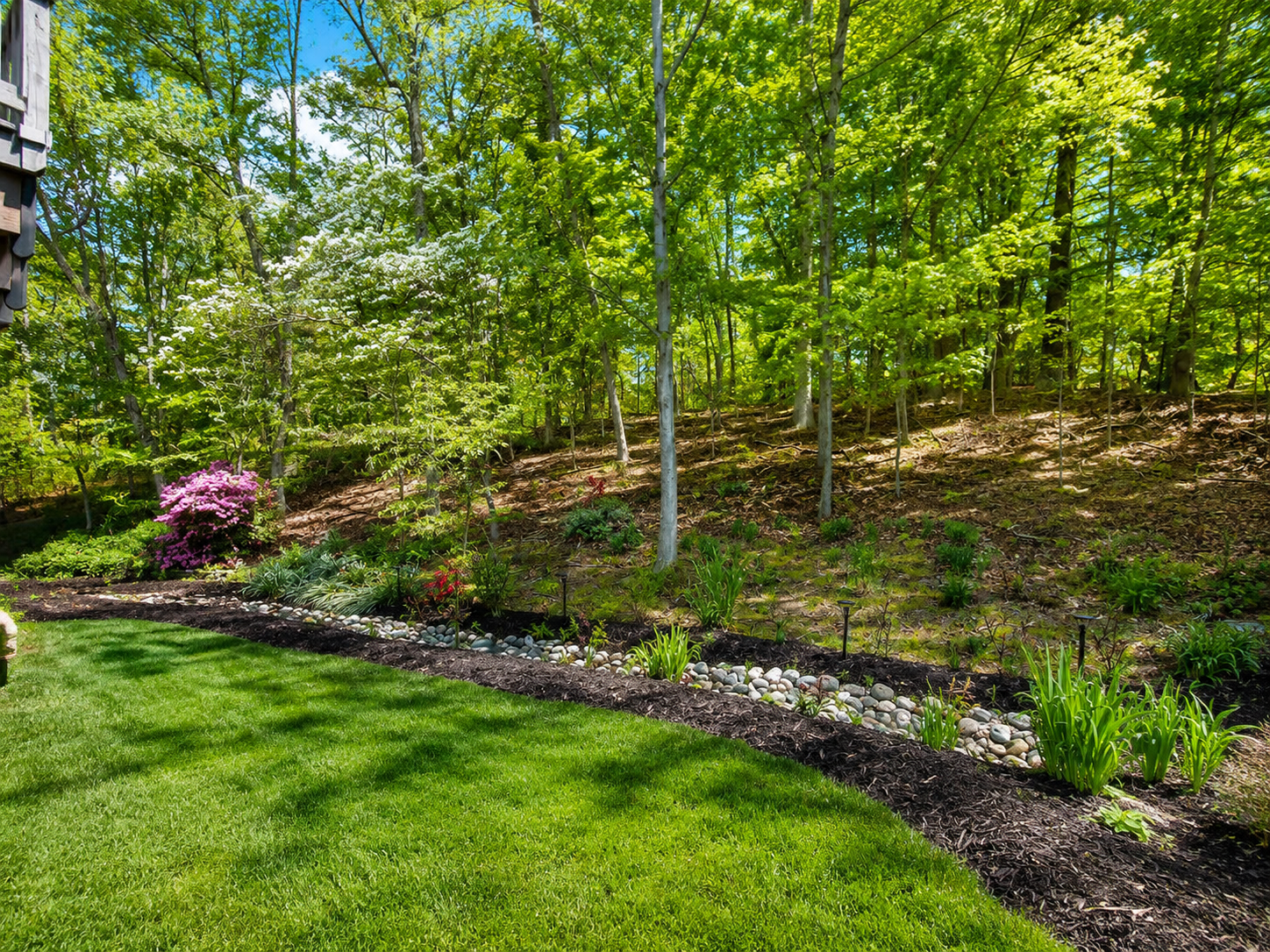 Lush, landscaped backyard of Your Home Assisted Living